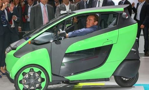 Arnold Schwarzenegger Behind Toyota i-Road Concept