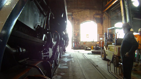 2011 Ford Ranger towing a locomotive