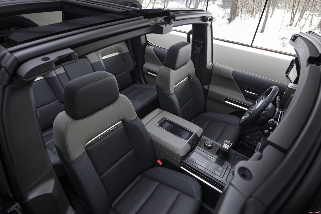 The GMC HUMMER EV SUV debuts in the low contrast Lunar Shadow interior and includes a spacious cargo area and an architecturally inspired cabin.